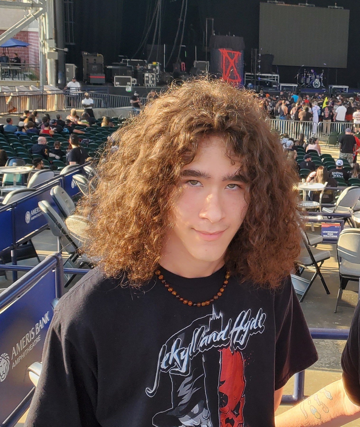 Portrait of Milo Powers at a concert venue