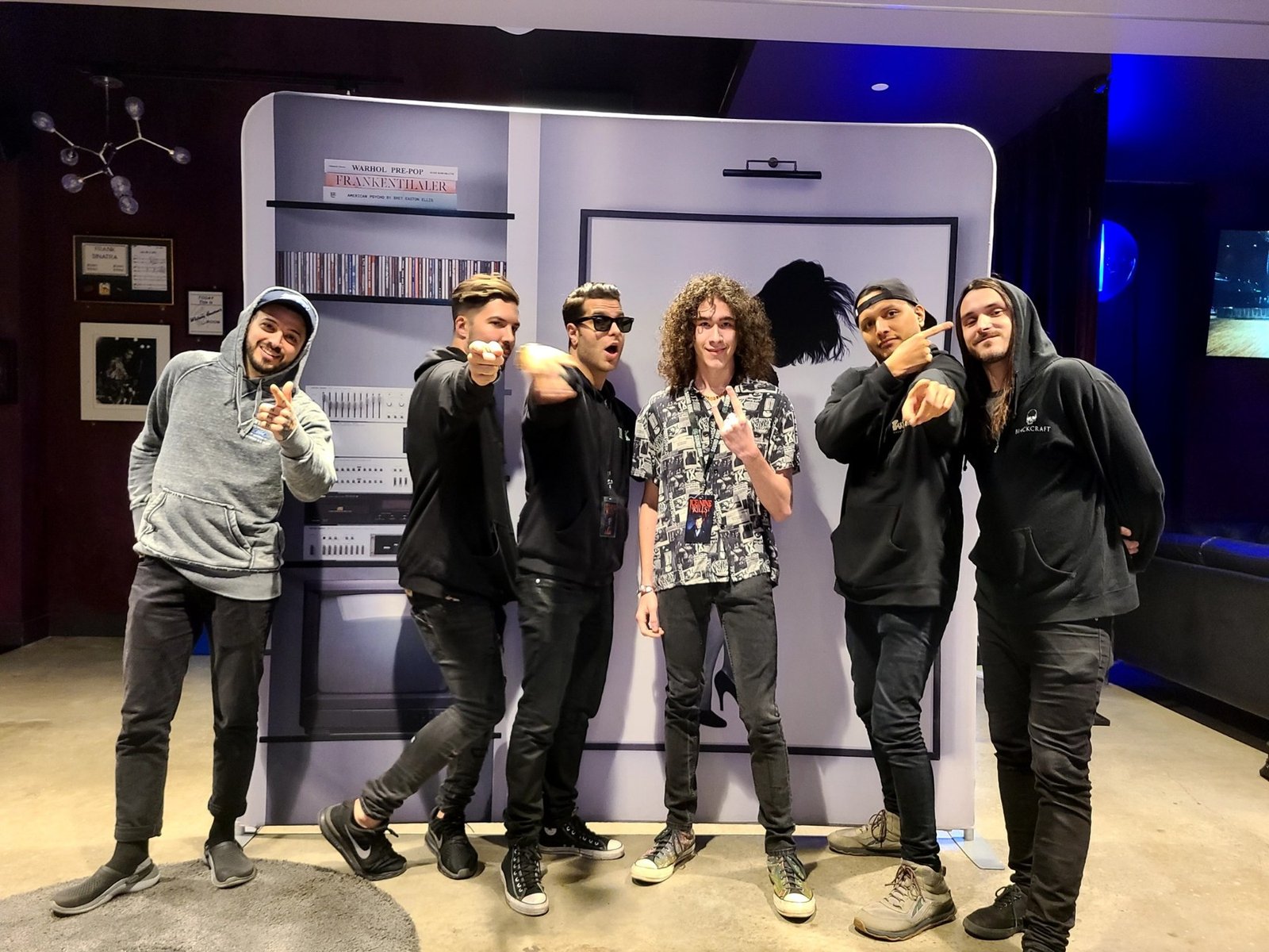 Milo Powers performing with other musicians outdoors